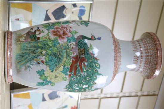 A Chinese famille rose vase and a crackle glaze dish